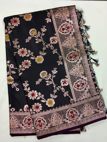 BKS132 Banarasi Mashru silk Saree in black. Comes with gold  zari work. Comes with stitched blouse size 38 can be altered to size 42. Fall peco done.