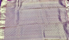 KSS415 Pure kanchipuram tissue silk Saree in orange with purple border gold zari work.comes with stitched blouse size 40,can be altered to 44 size.