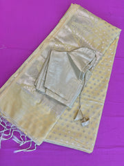 Semi Raw mango Saree in yellow with Silver  Zari Border.Fall peco done. Comess with stitched blouse size 38 can be altered up to 44