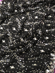 AFL3063 Partywear georgette saree in black with silver sequin and bead embroidery work.Comes with stitched blouse size 40,can be altered to 44 size.Fall peco done.