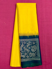 KSS426 Pure handloom kanchipuram silk Saree in green with blue gold zari border. Comes with stitched blouse size 40