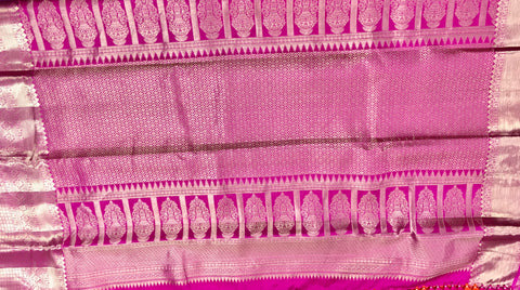 KSS432 Pure kanchipuram tissue silk Saree in orange with pink gold zari border . Comes with stitched blouse size 40,