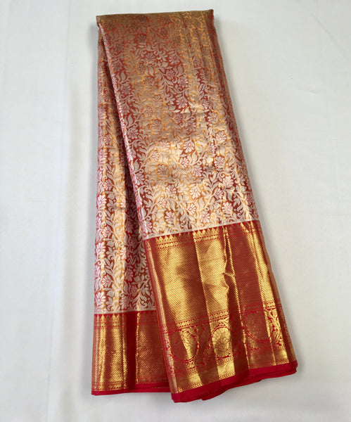 KSS510 Pure kanchipuram tissue silk Saree in orange with gold zari work.comes with stitched blouse size 40,can be altered to 44 size.