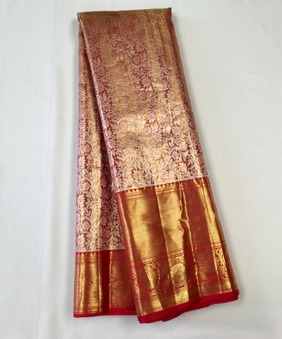 KSS510 Pure kanchipuram tissue silk Saree in orange with gold zari work.comes with stitched blouse size 40,can be altered to 44 size.