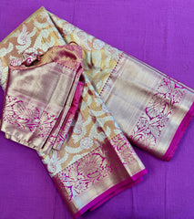 Semi silk Saree in Gold with Pink Border. Comess with stitched blouse size 38 can be altered up to 44