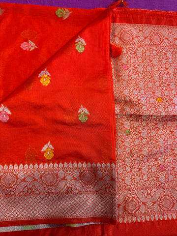 Banarasi Tussari saree in Orange with gold  zari border.Fall peco done. Comess with stitched blouse size 38 can be altered up to 44 size.