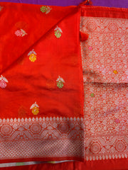 Banarasi Tussari saree in Orange with gold  zari border.Fall peco done. Comess with stitched blouse size 38 can be altered up to 44 size.