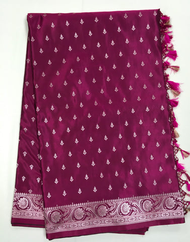 BKS126 Banarasi Mashru silk Saree in wine. Comes with gold  zari work. Comes with stitched blouse size 38 can be altered to size 42. Fall peco done.