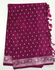 BKS126 Banarasi Mashru silk Saree in wine. Comes with gold  zari work. Comes with stitched blouse size 38 can be altered to size 42. Fall peco done.