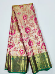 KSS512 Pure kanchipuram tissue silk Saree in pink with green color gold zari border. Comes with stitched blous.