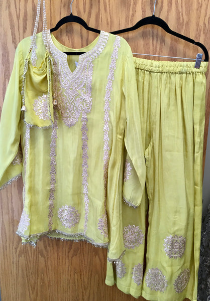 PNK511 kurti and pant with gold embroidery work and a potli