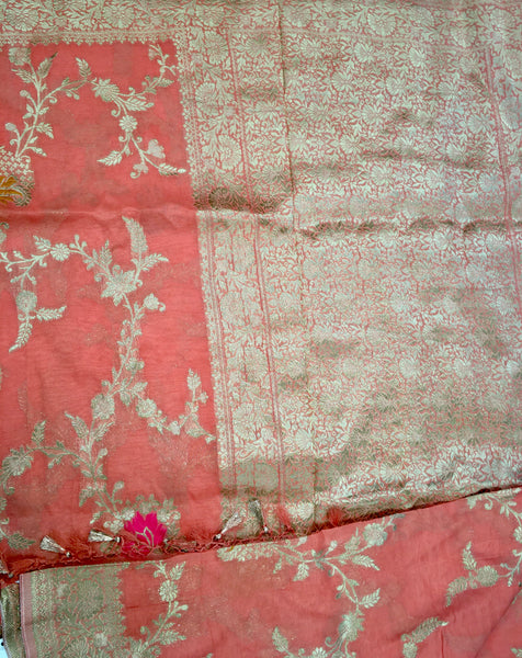 BKS110 Banarasi Georgette saree in peach. Comes with stitched blouse size 38 can be altered to size 42. Fall peco done.