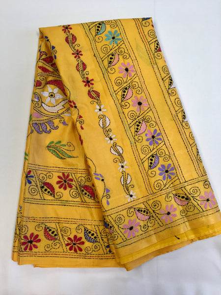 KSN203 - Semi Silk Kantha Tusser Saree in yellow hand work design. Fall Peco done. Comes with stitched Blouse size 38 it can be altered to 44 size.