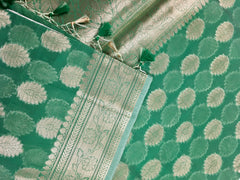 BKS136 Cotton Banarasi Saree in green. Comes with stitched blouse size 38 can be altered to size 42. Fall peco done.
