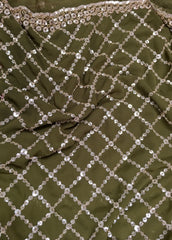 AFL3069 Partywear saree in green georgette fabric with silver sequins embroidery work.Comes with stitched blouse size 40,can be altered to 44 size.Fall peco done.