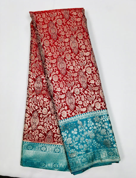KSS508 Pure kanchipuram handloom silk Saree in maroon with teal color and silver zari border. comes with stitched blouse size 40,can be altered to 44 size.