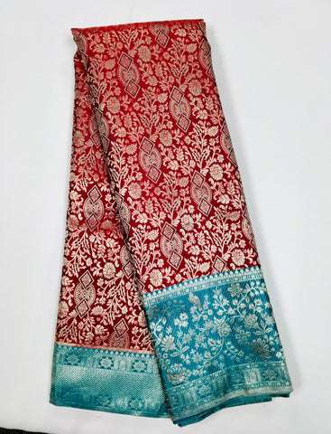 KSS508 Pure kanchipuram handloom silk Saree in maroon with teal color and silver zari border. comes with stitched blouse size 40,can be altered to 44 size.