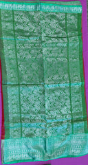 Banarasi Tussari saree in Red with Green  border.Fall peco done. Comes with stitched blouse size 38 can be altered up to 44 size.