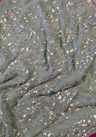 AFL3073 Party wear saree with sequin and bead work in light blue. Comes with stitched blouse size 38,can be altered to 42 size.Fall peco done.