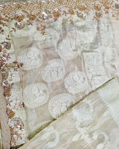 AFL8006 Pure banarasi crepe tissue saree in beige with heavy hand embroidery party wear Saree.comes with stitched blouse size 38 can be altered to 44 size.
