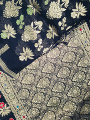 BKS106 Banarasi Georgette saree in black. Comes with stitched blouse size 38 can be altered to size 42. Fall peco done.