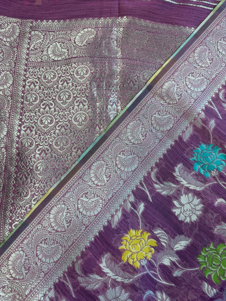 Banarasi tussar  saree in purple with gold  zari border.Fall peco done. Comess with stitched blouse size 38 can be altered up to 44 size.