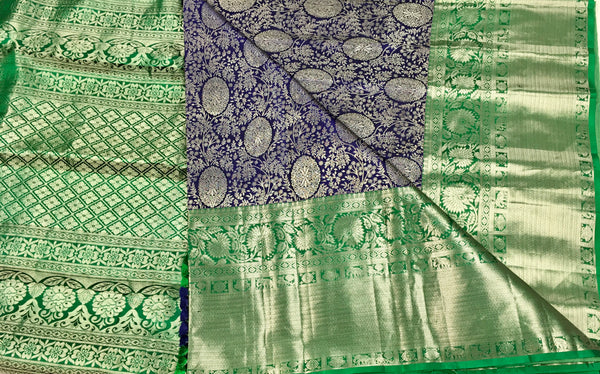 KSS507 Pure kanchipuram handloom silk Saree in purple with green color gold zari border. comes with stitched blouse size 40,can be altered to 44 size.