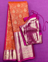 KSS432 Pure kanchipuram tissue silk Saree in orange with pink gold zari border .comes with stitched blouse size 40,can be altered to 44 size.