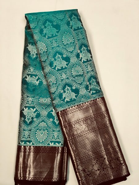 KSS509 Pure kanchipuram handloom silk Saree in blue with brown color gold zari border. comes with stitched blouse size 40,can be altered to 44 size.