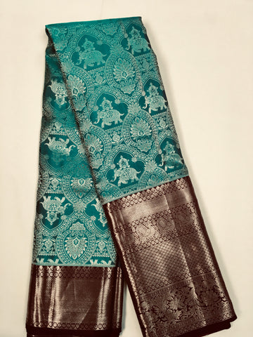 KSS509 Pure kanchipuram handloom silk Saree in blue with brown color gold zari border. comes with stitched blouse size 40,can be altered to 44 size.