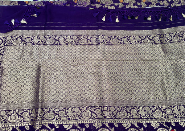 BKS103 Banarasi Georgette saree in purple.Comes with stitched blouse size 38 can be altered to size 42. Fall peco done.