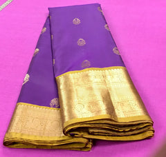 KSS421 Pure kanchipuram silk Saree in purple and green Zari border.comes with stitched blouse size 40,can be altered to 44 size.Fall peco done.