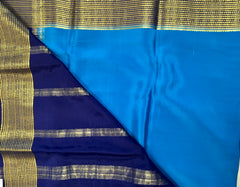 AMS1004 Pure Mysore Crepe silk Saree in blue color with dark blue gold zair border. Comes with unstitched blouse.