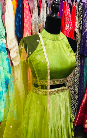 AFL9036 lehenga in green . Comes with matching stitched blouse and dupatta.
