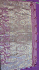 Banarasi Tussari georgette saree in Onion Pink with gold and silver zari border.Fall peco done. Comess with stitched blouse size 38 can be altered up to 44 size.