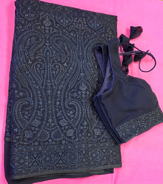 AFL3062 Georgette party wear Saree in Blue comes with Chickenkary embroidered and stone work. Come with stitched blouse size 38 can be altered to 42 size.Fall peco done.