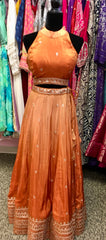 AFL9033 lehenga in orange . Comes with matching stitched blouse and dupatta.