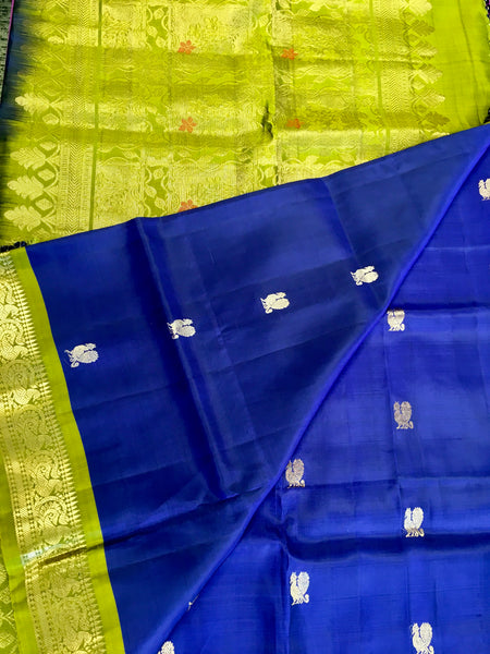 Pure kanchipuram Handloom Silk Saree in navy blue with Green Border. Comess with Stitched Blouse size 38 can be altered up to 44 size.