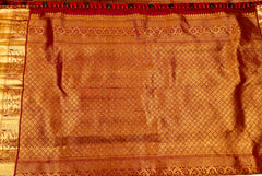 KSS501 Pure kanchipuram handloom silk Saree in red color with gold zari border. comes with stitched blouse size 40,can be altered to 44 size.
