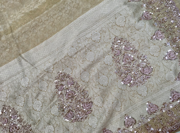 AFL8003 Pure banarasi crepe tissue saree in beige with heavy hand embroidery party wear Saree.comes with stitched blouse size 38 can be altered to 44 size.