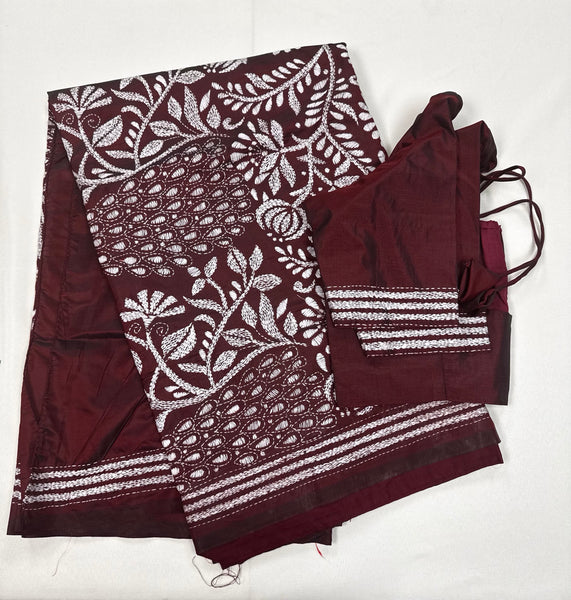 KSN209: Semi Silk Kantha Tusser Saree in maroon hand work design. Fall Peco done. Comes with stitched Blouse size 38 it can be altered to 44 size.