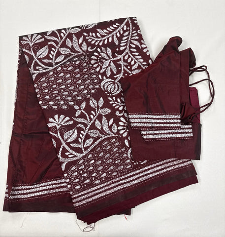 KSN209: Semi Silk Kantha Tusser Saree in maroon hand work design. Fall Peco done. Comes with stitched Blouse size 38 it can be altered to 44 size.