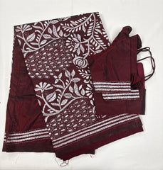 KSN209: Semi Silk Kantha Tusser Saree in maroon hand work design. Fall Peco done. Comes with stitched Blouse size 38 it can be altered to 44 size.