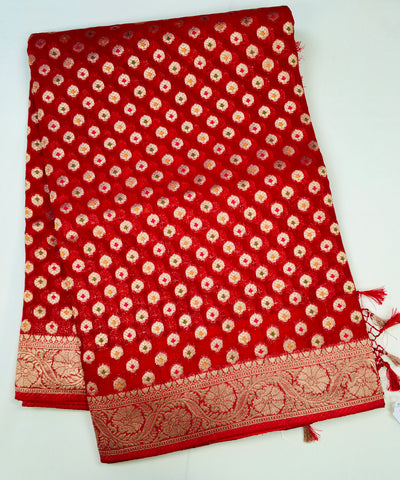 BKS102 Banarasi Georgette saree in red. Comes with stitched blouse size 38 can be altered to size 42. Fall peco done.