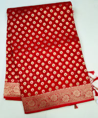 BKS102 Banarasi Georgette saree in red. Comes with stitched blouse size 38 can be altered to size 42. Fall peco done.