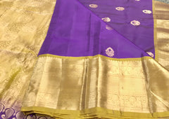 KSS421 Pure kanchipuram silk Saree in purple and green Zari border.comes with stitched blouse size 40,can be altered to 44 size.Fall peco done.