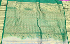 KSS420 Pure handloom kanchipuram silk Saree in gray with green gold zari border.comes with stitched blouse size 40,can be altered to 44 size.
