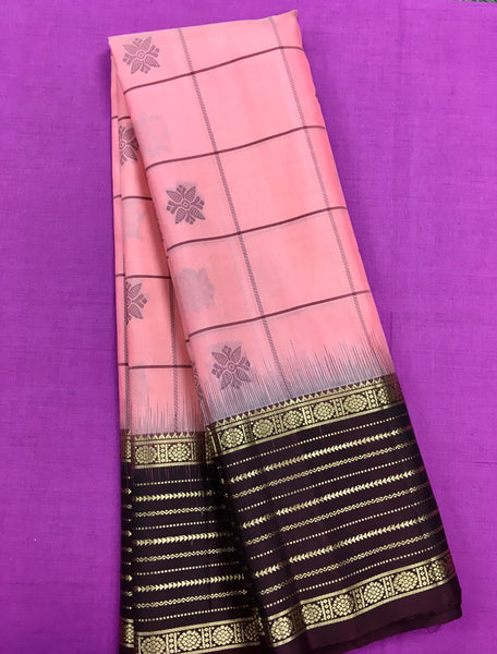 KSS431 Pure handloom kanchipuram silk Saree in pink with brown gold zari border.comes with stitched blouse size 40,can be altered to 44 size.