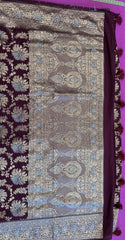 Banarasi Tussari georgette saree in Brown with gold and silver zari border.Fall peco done. Comess with stitched blouse size 38 can be altered up to 44 size.