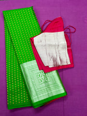 KSS402 Pure handloom kanchipuram silk Saree in green with gold and silver zari border. Comes with stitched blouse size 40,